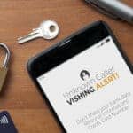 Introducing the concept of vishing (voice phishing): Imagine a scenario where a smartphone rests on a table, showing an incoming call from an unknown number. A vishing alert pops up, reminding you never to share sensitive information like bank details, personal information, or credit card numbers over the phone.